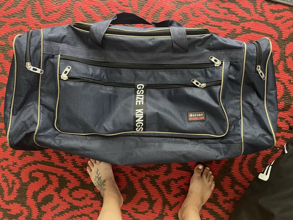 Дорожні сумки великого розміру