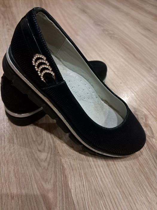 Дитячі туфельки.