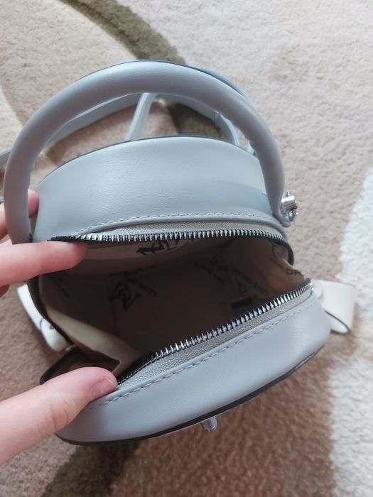 Жіноча маленька кругла сумочка