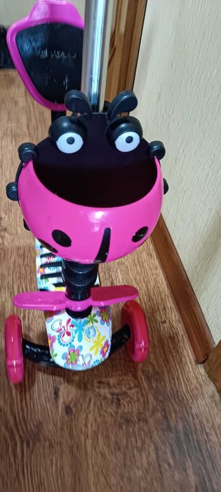 Самокат з батьківською ручкою та сидінням