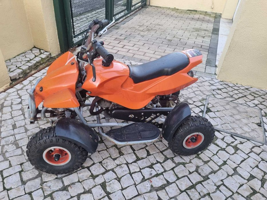 Moto 4 de criança a gasolina