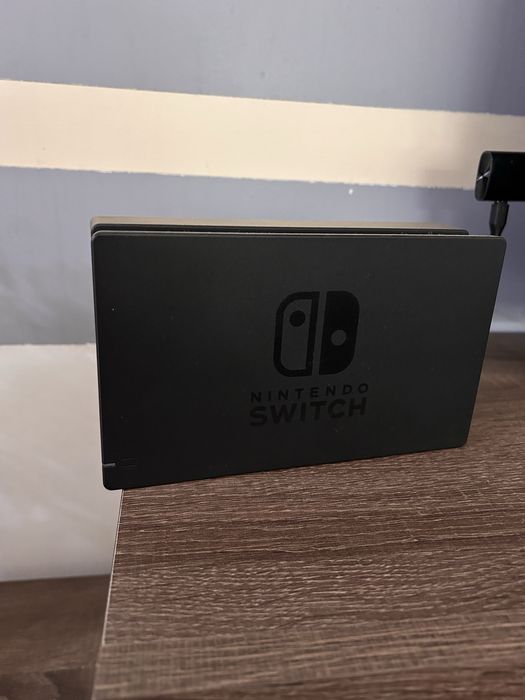 Nintendo switch com 4 comandos e 6 jogos