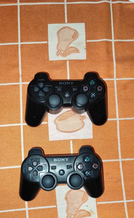PlayStation 3 Fat 40GB com 2 comandos e jogos