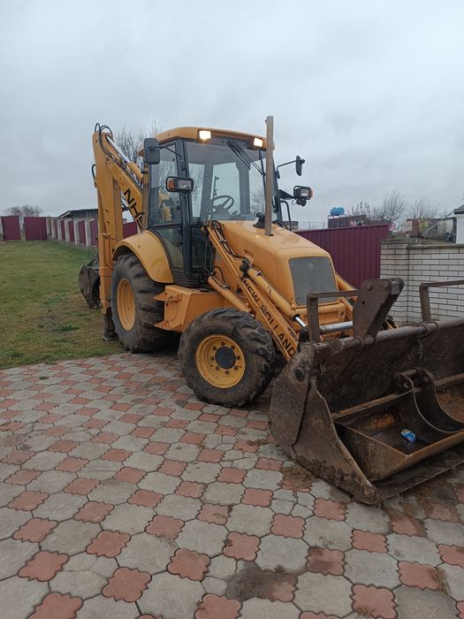 Продам екскаватор-навантажувач Ньюхоленд