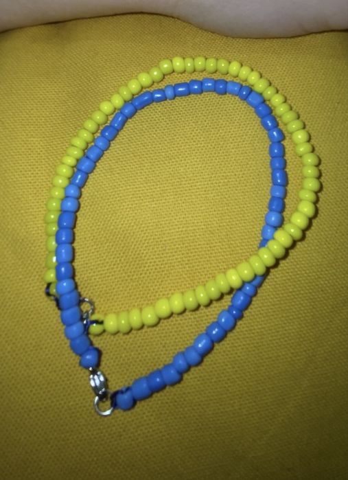 Brasoletka 20,5 cm z koralikow zolta z niebieska Ukraina