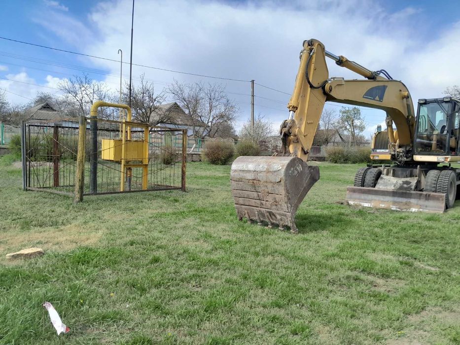 Услуги экскаватора и самосвалов