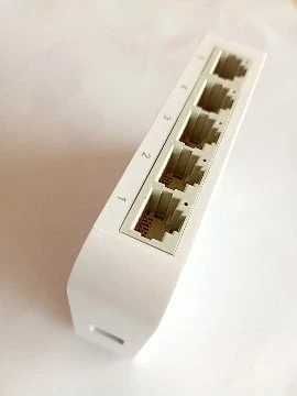 Switch de Rede TP-Link TL-SF1005D + Fonte de Alimentação + Manual