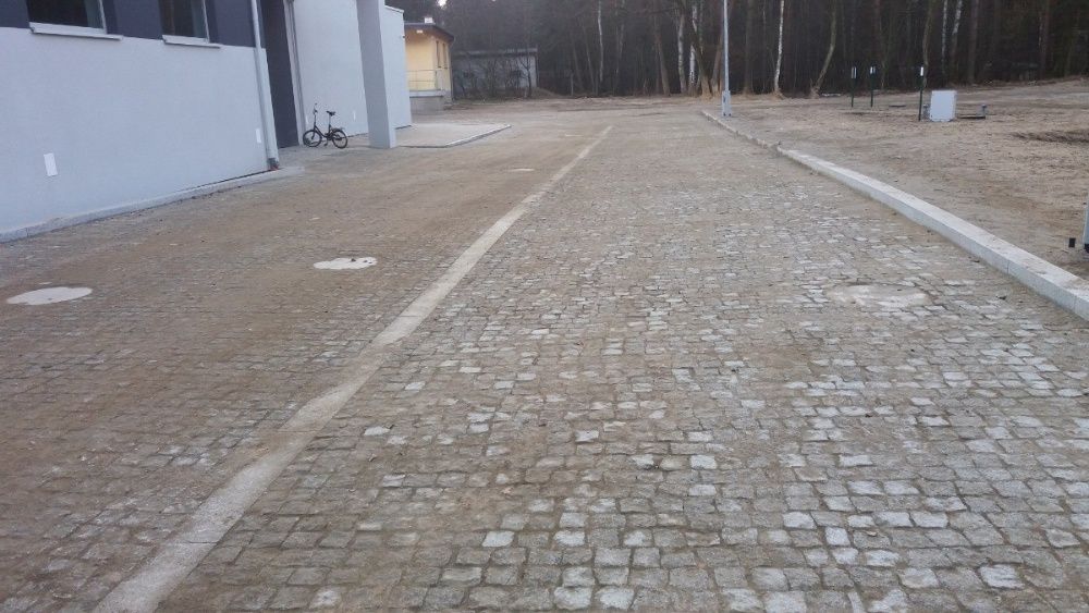 Brukarstwo przemysłowe układanie maszynowe układarka  leveller system
