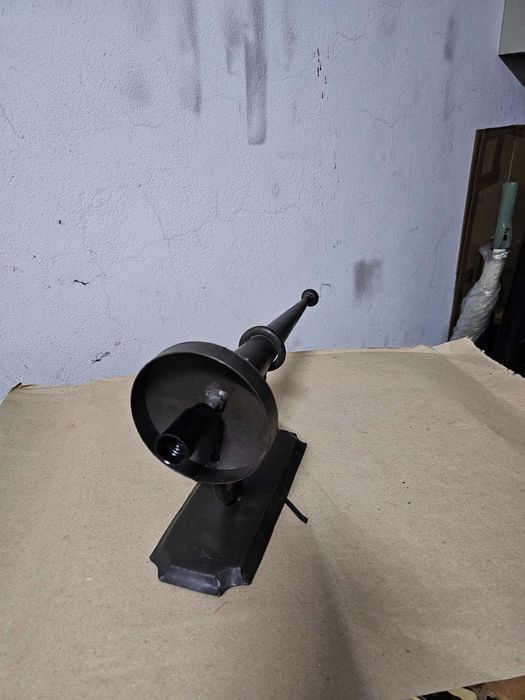 Candeeiro de parede em forma de tocha