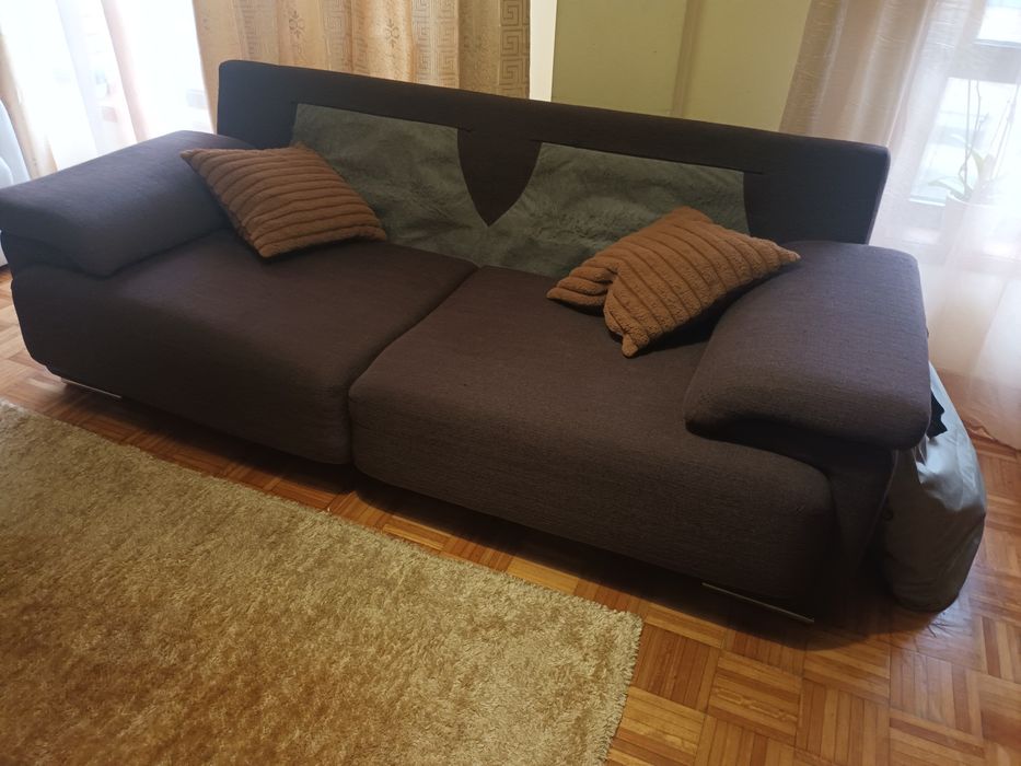 Sofá cama de três lugares