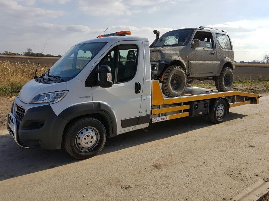 TANIA Laweta holowanie pojazdów transport aut pomoc drogowa 24h