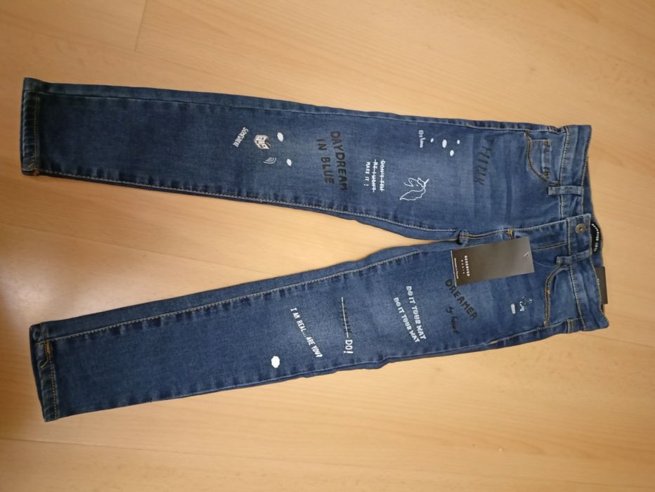 Nowe spodnie jeansy Reserved 116