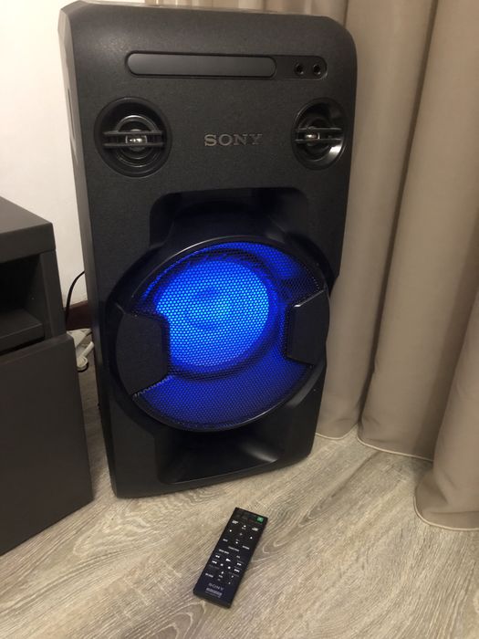Coluna de som com comando  Soni