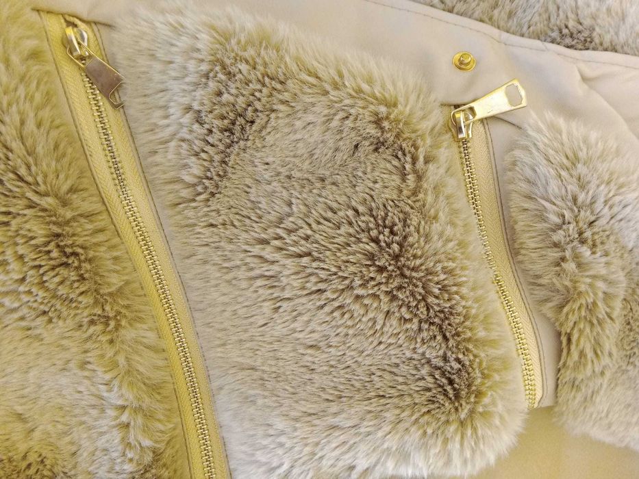 Colete You e Me Paris, muito bem cuidado.