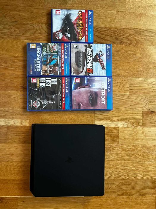 PlayStation 4 slim + 8 gier