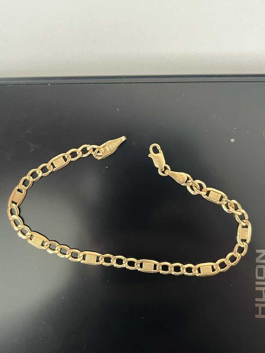 Złota 14K bransoleta w splocie typu Figaro
