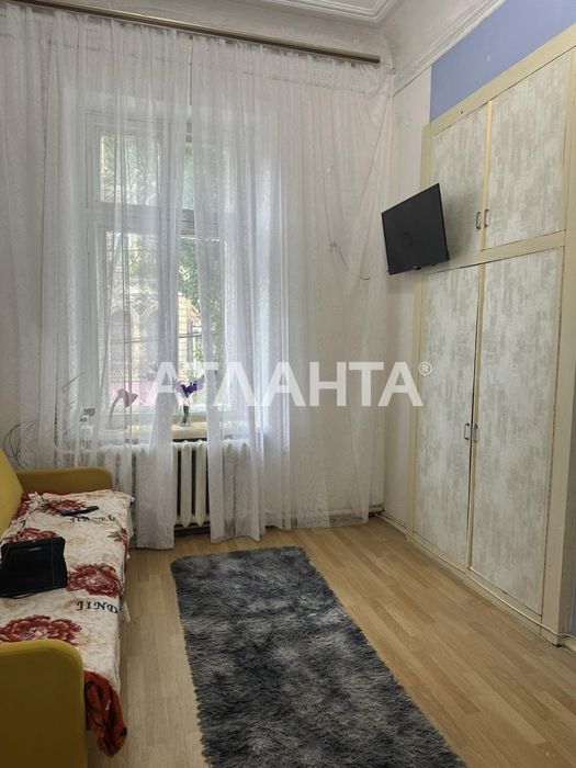 Продам двухуровневую комнату  в центре