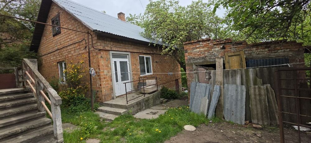 Земельна ділянка 10 с та два будинки. Любі державні програми
