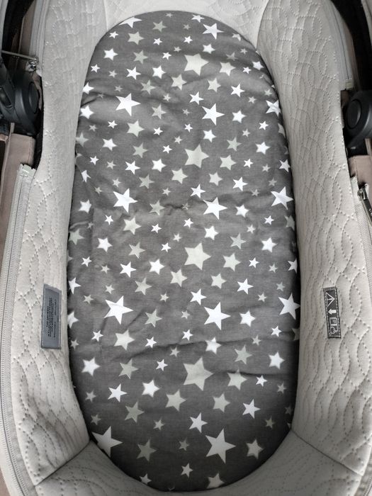 Непромокаюча простинь в коляску