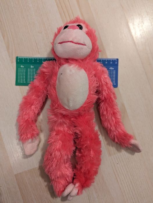 Małpka czerwona maskotka