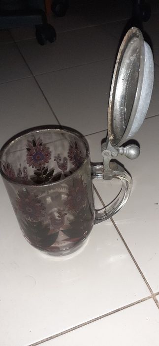 Caneca em vidro.