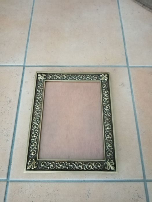 Moldura usada em bronze