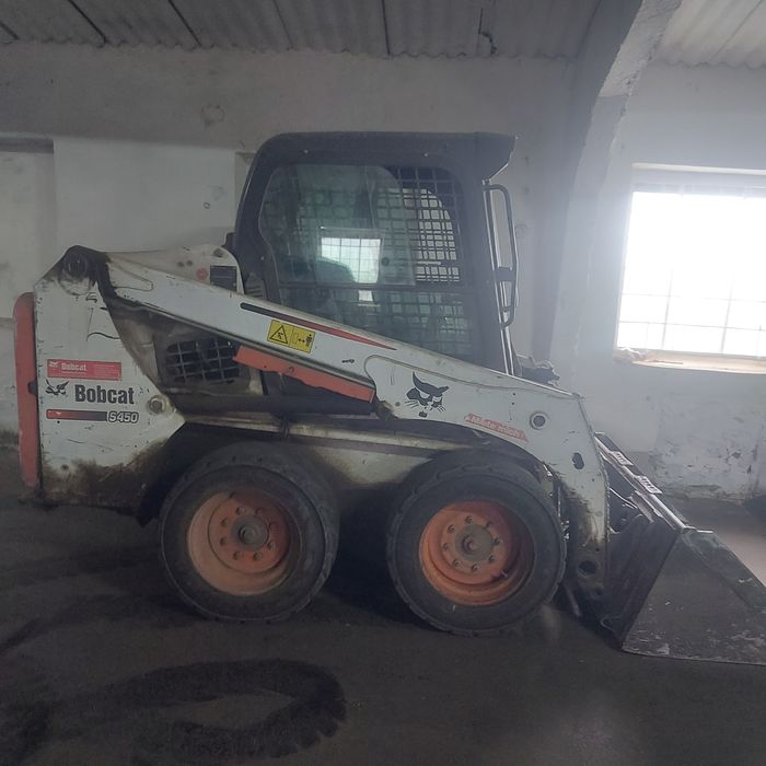 Бобкат погрузчик