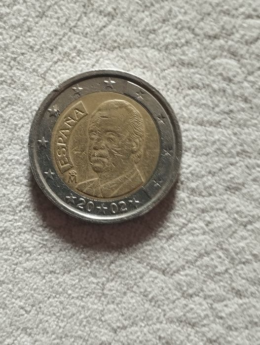 Moedas de 2 euros, Espanha, França e Alemanha.