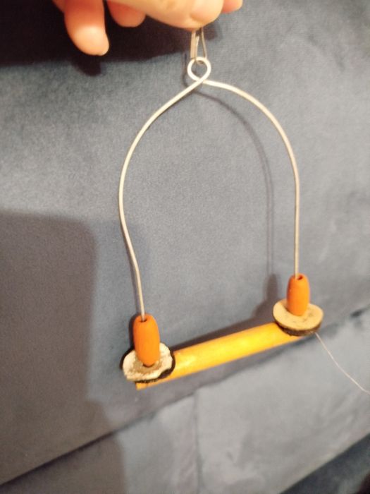 Дерев'яні іграшки-гойдалки, драбини для папужки