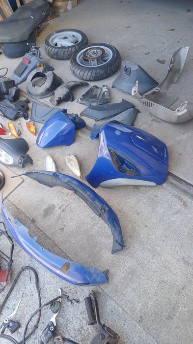 Piaggio FLY 50 części kufer,wydech,lampa,pokrywa,stelaż,wał,błotnik,