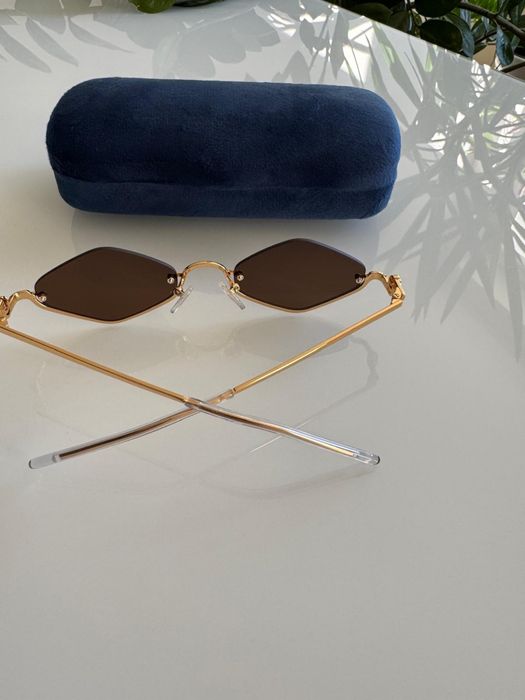 Złote okulary przeciwsloneczne Gucci
