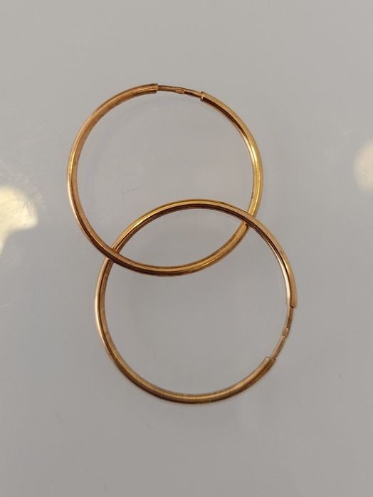 Argolas douradas em prata