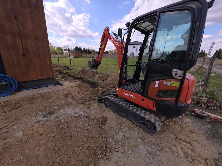 Wynajem koparka Sosnowiec kubota minikoparka ladowarka załadunek gruzu uslugi koparką wykop wykopy rozbiorki baseny drenaż zbiornik na deszczówkę