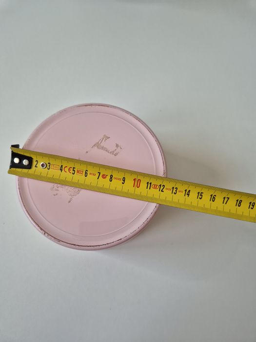 Różowa szklana osłonka doniczka na kwiaty używana