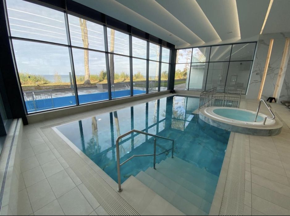Apartament REWAL, POGORZELICA (GMINA REWAL) STREFA SPA , prywatne zejście do morza, SPA