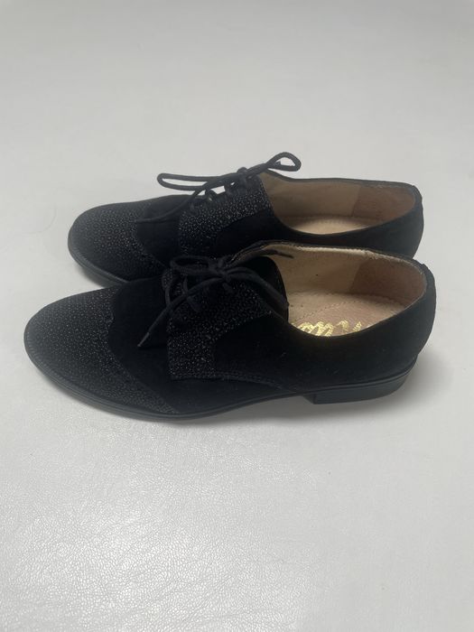 Sapatos classicos de cordão