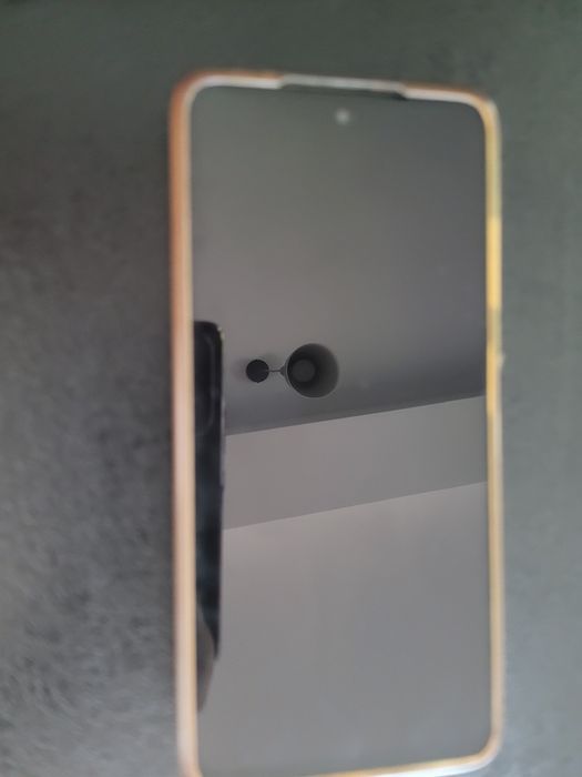 Smartphone Poco czarny z etui