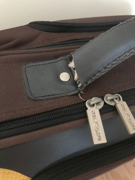 Nowa mała brązowa walizka, duża torba biznesowa na kółkach