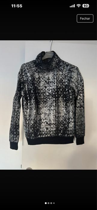 Camisola preta e prateada