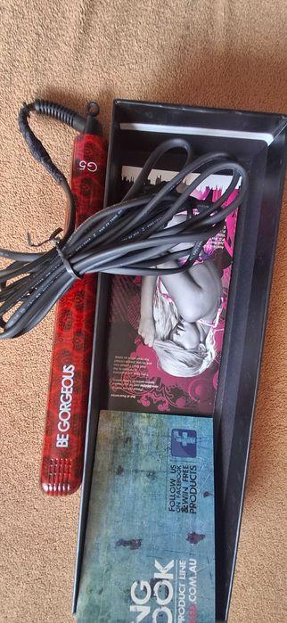 Випрамлювачі волосся (плойка)