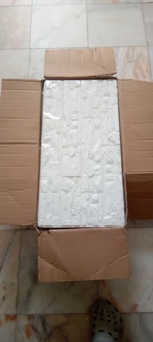 Caixa painéis de colar a parede