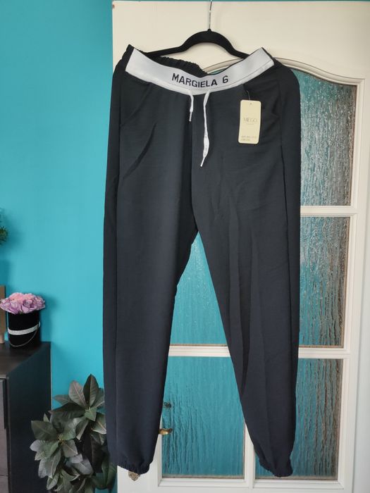 Nowe czarne kreszowane spodnie XXL do 100 pas