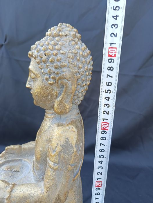 Figurka Budda wykonana z tworzywa
