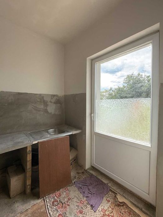 Квартира з окремим входом, автономним опаленням та ділянкою 2.5 сот