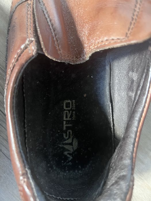 Sapato castanho de homem