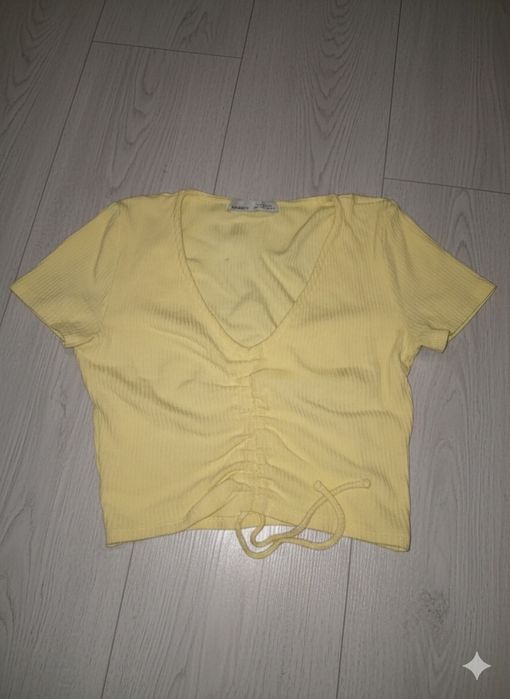 Жовтий топ з утяжкою