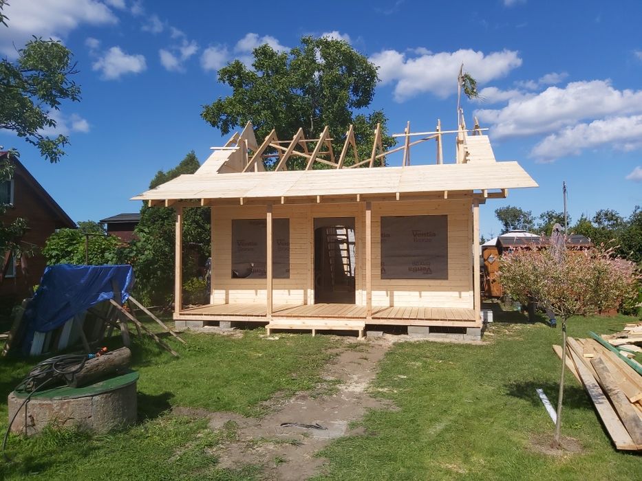 Domek drewniany z tarasem i podaszem użytkowym Domek letniskowy