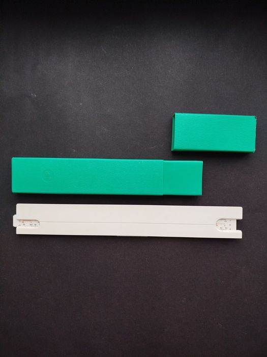 Логарифмічні лінійки 76-77 роки дерево/пластик.