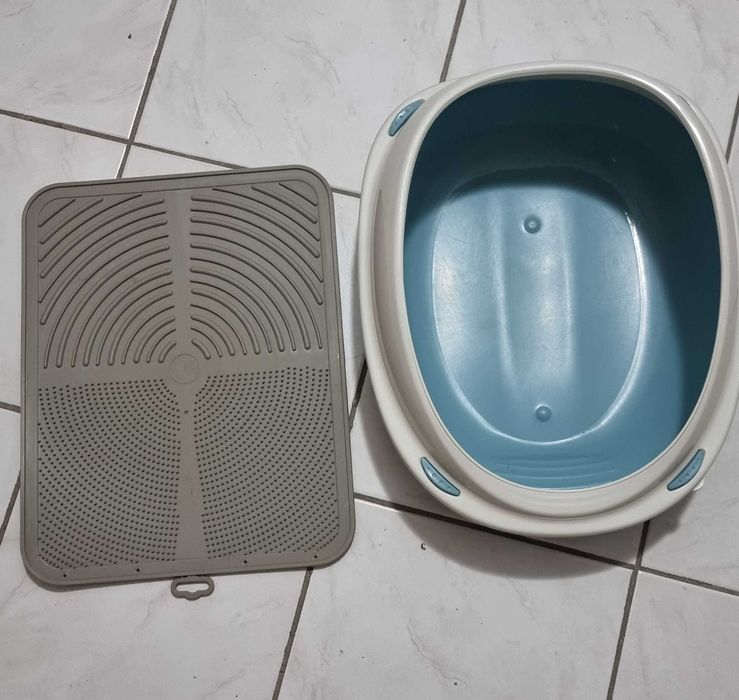 Caixa e tapete para gato