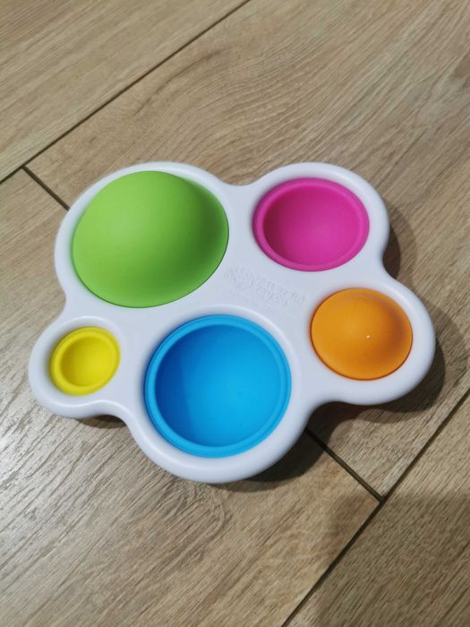 Dimpl fat brain toys + wieża Fisher price